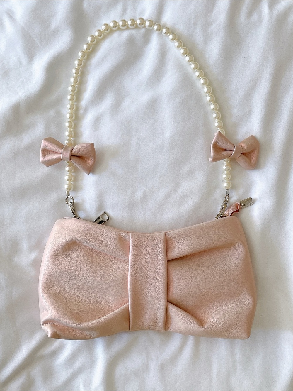 Elegant Pink Bow Clutch with Pearl Strap